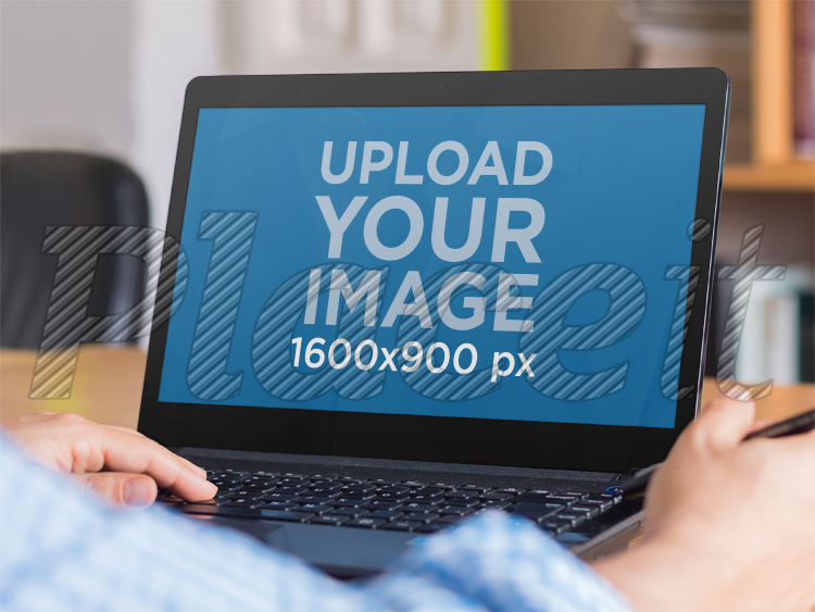 placeit young man at work on black samsung laptop mockup template