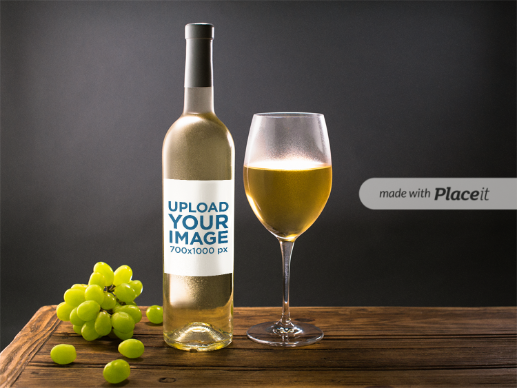 placeit template of a white wine bottle and a glass with grapes