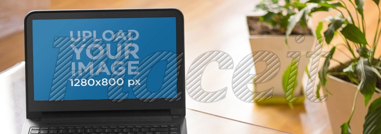 placeit laptop mockup template of a dell inspiron at a home office