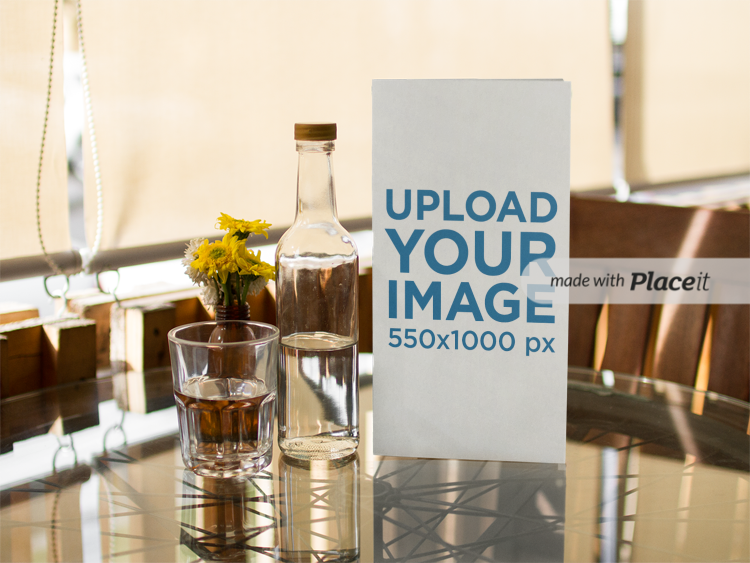 placeit booklet menu standing on a small dining restaurant table