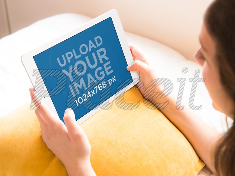 placeit young woman uses ipad on bed tablet mock up template