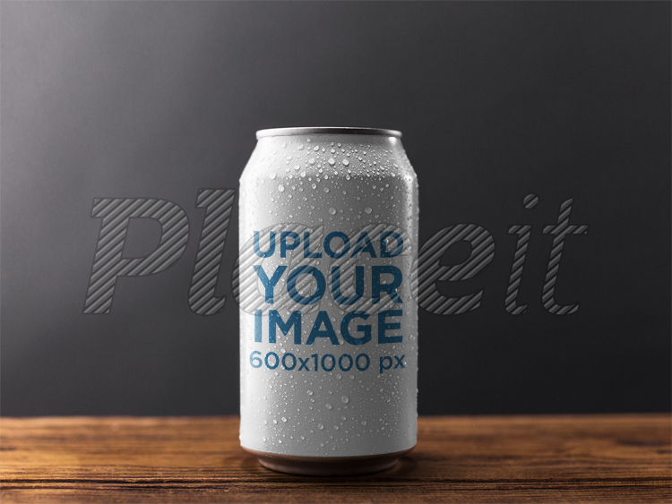 placeit can template on a wooden table against a black background